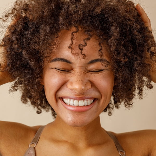 a woman smiling for the camera